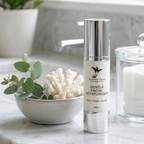 Cosmetic bottle on a marble countertop with decorative elements